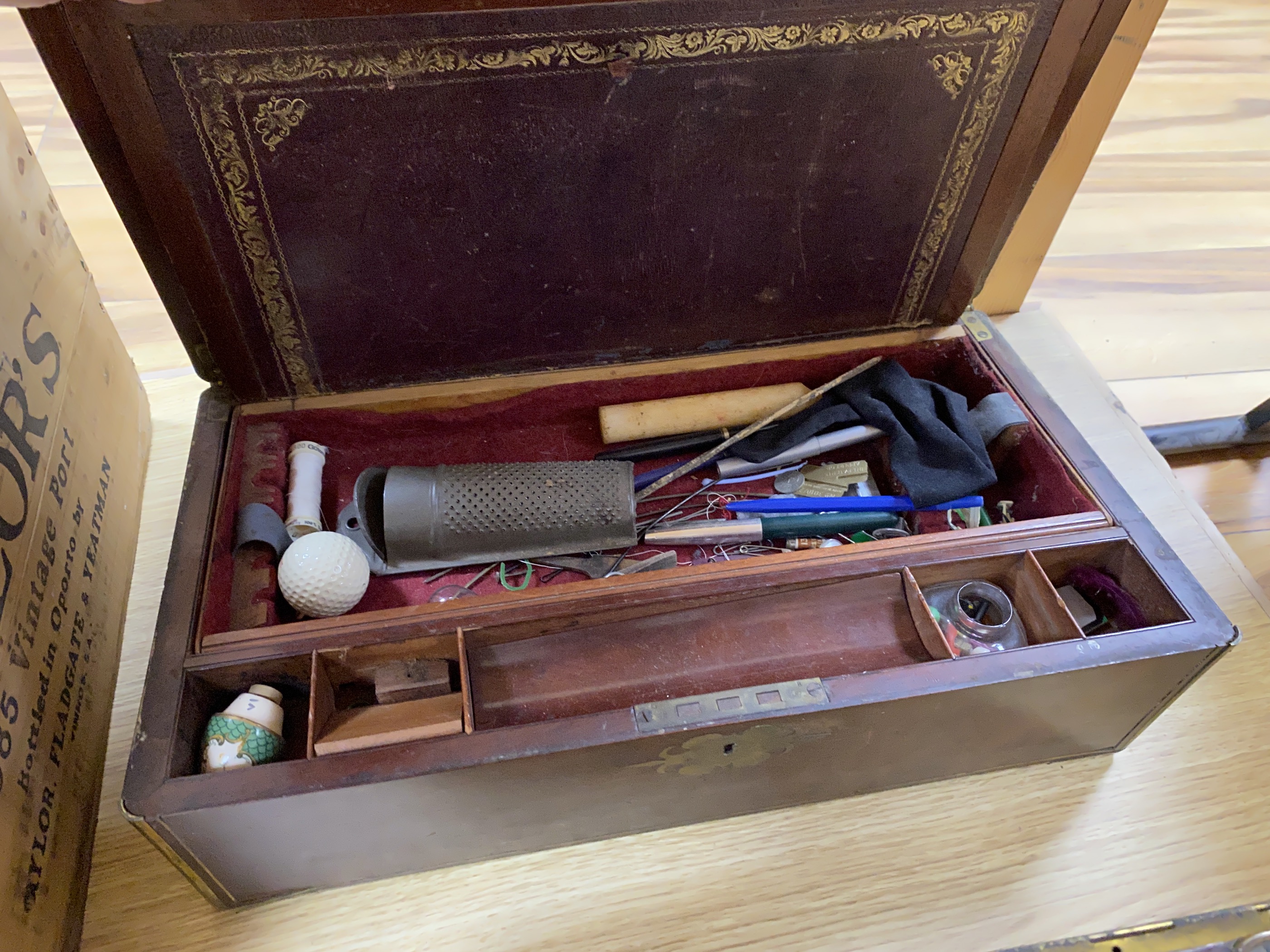 A George III mahogany and brass bound writing slope, a painted sewing box and an oak brass mounted sewing box, (3), writing slope 45cm wide x 26cm deep